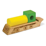 Green and yellow wooden train whistle. 