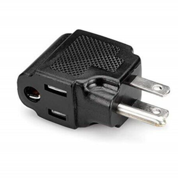 The image shows a black electrical power adapter with metal prongs and multiple outlet receptacles for different plug types. While not a musical instrument product, such adapters are often used by musicians and audio professionals to connect and power equipment like amplifiers, keyboards, and recording gear, especially when traveling or using devices with varying plug configurations.