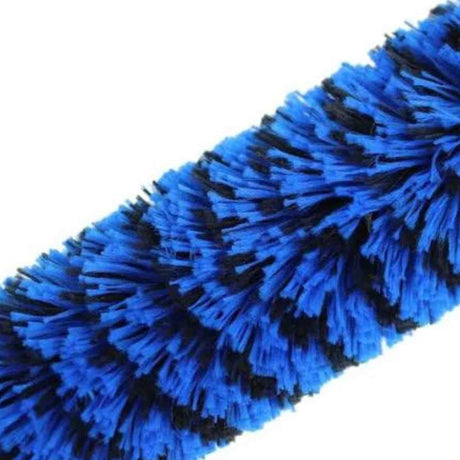 The image shows a drum brush with blue bristles and black bands arranged in a fan shape. This percussion accessory is used by drummers, especially in jazz and softer music styles, to create a gentle, subtle sound by sweeping or tapping drum heads, typically snare drums. Drum brushes offer varied tonal dynamics, making them essential for acoustic performances and studio recordings.