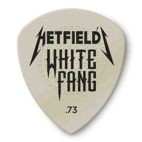 The image shows a white or cream-colored guitar pick with a teardrop shape. It features "HETFIELD" and "WHITE FANG" in a jagged, Metallica-style font, a ".73" thickness marking, and a subtle textured background for grip. This signature pick likely references James Hetfield and Metallica, combining collectible appeal with functional design.