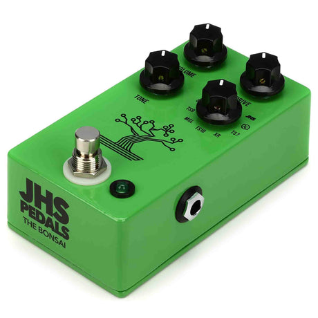 Green guitar effects pedal with black knobs and JHS Pedals branding on a white background