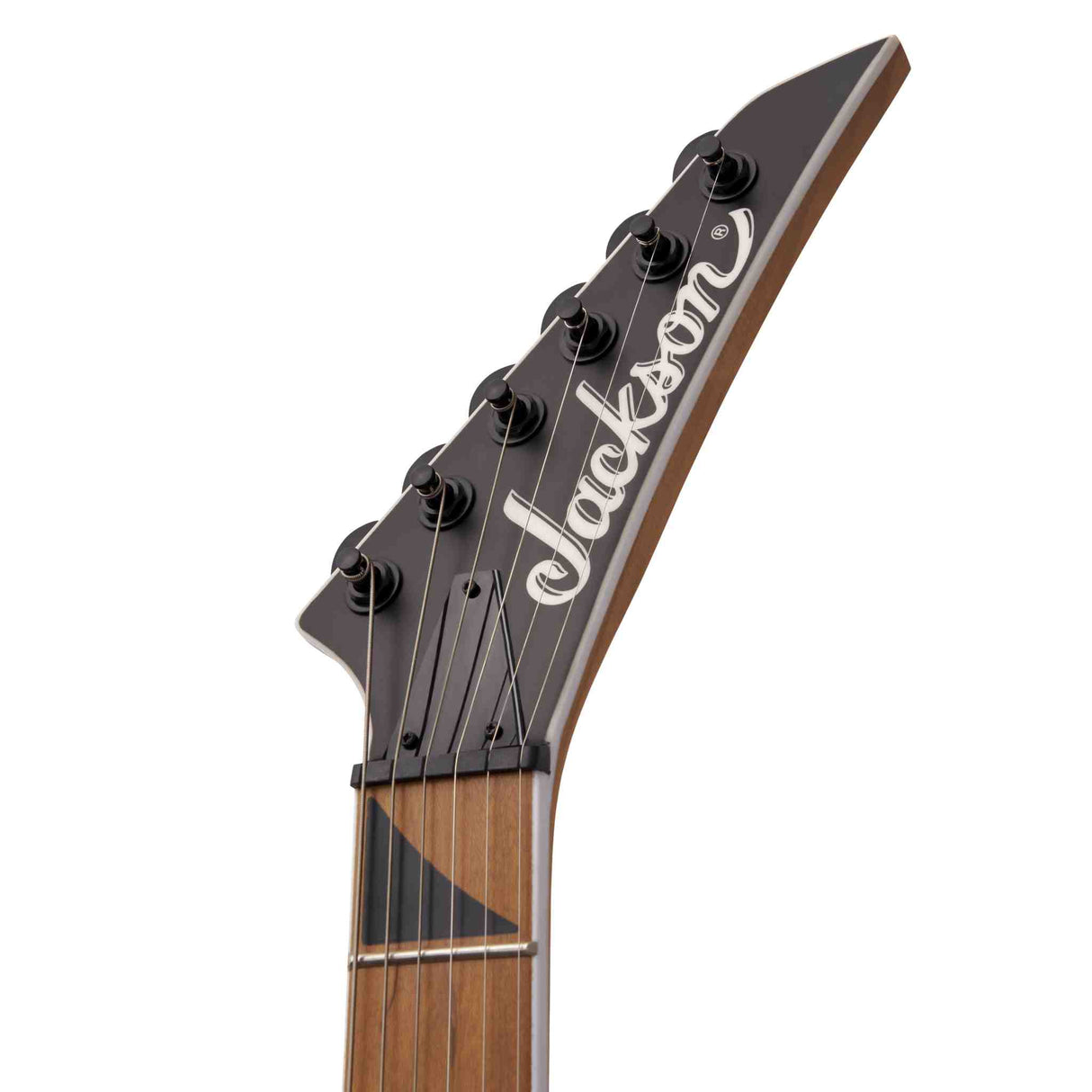 A close up a the front of a headstock of a Jackson JS Series Dinky Arch Top JS24 DKAM electric guitar on a white background. The headstock is black with black tuners and the cursive white jackson logo on it. 