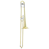 The image shows a tenor trombone, a brass wind instrument with a golden lacquered finish. It features a flared bell for sound projection, a long telescoping slide to change pitch, a tuning slide for fine adjustments, and a mouthpiece receiver at the top. The slide allows smooth glissandos and access to a full chromatic range, making the trombone unique among brass instruments.