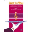 The image shows the cover of "Just for You" Book One by Dennis Alexander, a Mid Elementary piano collection published by Alfred Music. It features a vibrant pink background, orange title text, a gold treble clef on musical staff lines, and an illustration of hands playing piano keys. The subtitle highlights a variety of styles meant to inspire and entertain young piano students.