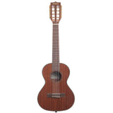 The image shows a concert ukulele with a natural mahogany finish, featuring a traditional figure-8 body, four strings, a fretted neck with dot markers, and classical tuning pegs. The headstock displays the "Kala" logo. This mid-sized ukulele, larger than a soprano but smaller than a tenor, is known for its warm tone and comfortable playability, often favored by both beginners and experienced musicians.