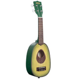 The image shows a novelty ukulele designed to look like an avocado. It features a green body with a yellow-green interior, a sound hole where the pit would be, a dark wooden neck, white tuning pegs, and "KALA" branding on the headstock. This functional 4-string ukulele is likely soprano or concert size, blending playful design with standard musical features for both players and collectors.