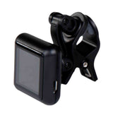 The image shows a black clip-on guitar tuner with a compact design, featuring a digital LCD display and a spring-loaded clip to attach to a guitar or other stringed instruments. It has an adjustable swivel joint for easy viewing. This tuner detects vibrations directly from the instrument, making it convenient, accurate, and ideal for tuning guitars, basses, ukuleles, and more in noisy environments.