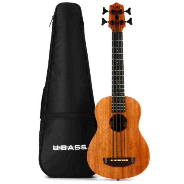 The image shows a Kala ukulele bass (U-Bass) with its black padded carrying case. The instrument has a compact, natural-finish body, four strings, a dark fretboard with position markers, black tuning pegs, and a traditional ukulele shape designed for bass tones. The soft case features a zipper, handle, and white "U•BASS" branding. This modern instrument delivers bass sounds in a portable ukulele form.