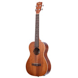 The image shows a beautiful tenor or concert ukulele with a warm-toned wooden body, likely mahogany, and a natural finish. It features a traditional figure-8 shape, central sound hole, four geared tuning pegs, a dark fretboard with white markers, and four strings. The headstock displays a partially visible logo. The instrument’s clean craftsmanship and quality materials suggest it is a mid- to high-end model.