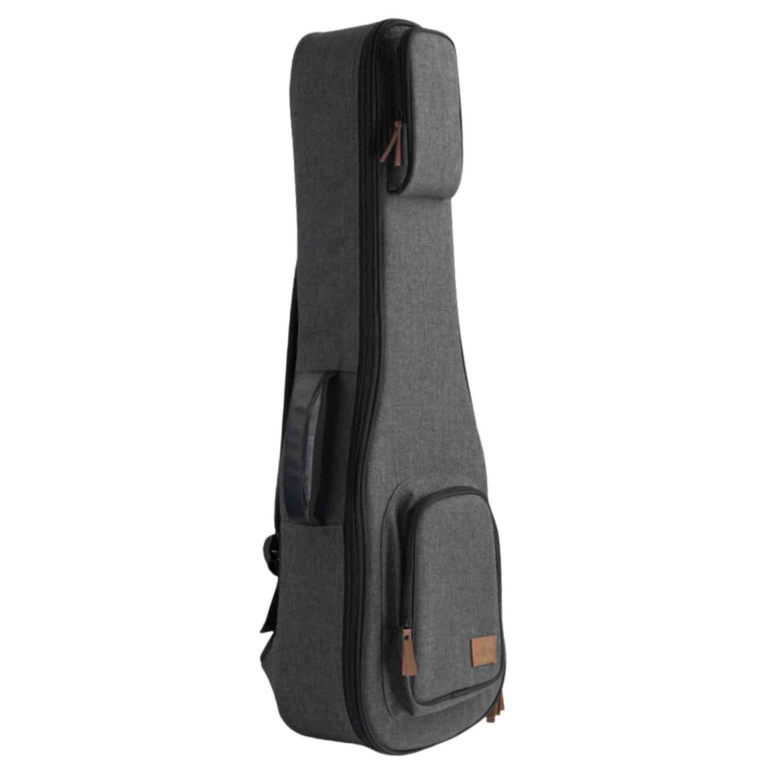 The image shows a soft-shell guitar gig bag with a dark gray textured fabric exterior, black trim, brown leather-like accents, and hardware. It has multiple carrying straps, a front pocket for accessories, and padded construction to protect the instrument. This lightweight, portable case offers protection against minor impacts, dust, and weather, making it ideal for transporting guitars to gigs, lessons, or recordings.