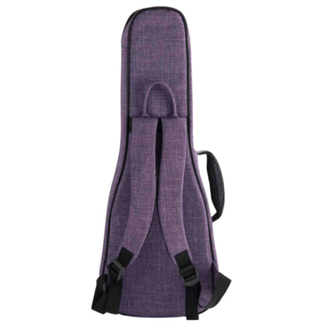 The image shows a purple/lavender ukulele gig bag with a textured fabric exterior and black trim. It features a top handle and adjustable backpack-style straps with black buckles. The soft-sided, lightweight case has an elongated shape typical of ukulele cases, designed for easy and protective transport, combining portability and practicality for musicians.