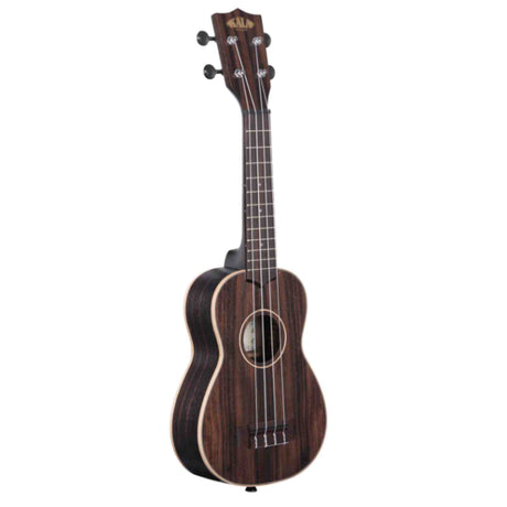 The image shows a dark wood ukulele, likely rosewood, with natural grain patterns. It has a traditional soprano or concert shape, four nylon strings, four tuning pegs, a fretted neck with position markers, a round sound hole, and light binding contrasting the body. The "Kala" logo is visible on the headstock, indicating a quality mid-to-high-end instrument from Kala Brand Music Co.