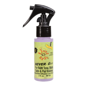 The image shows a 2 fl. oz. bottle of "NEVER-Gloss" guitar care spray with a black trigger nozzle containing light purple liquid. The colorful, vintage-style label features green and yellow tones with a skull or face graphic and states it’s for RAW Tone, Matte, Satin & Flat finishes. This product is designed to clean and protect non-gloss guitar finishes, providing easy spray application for maintenance and preservation.