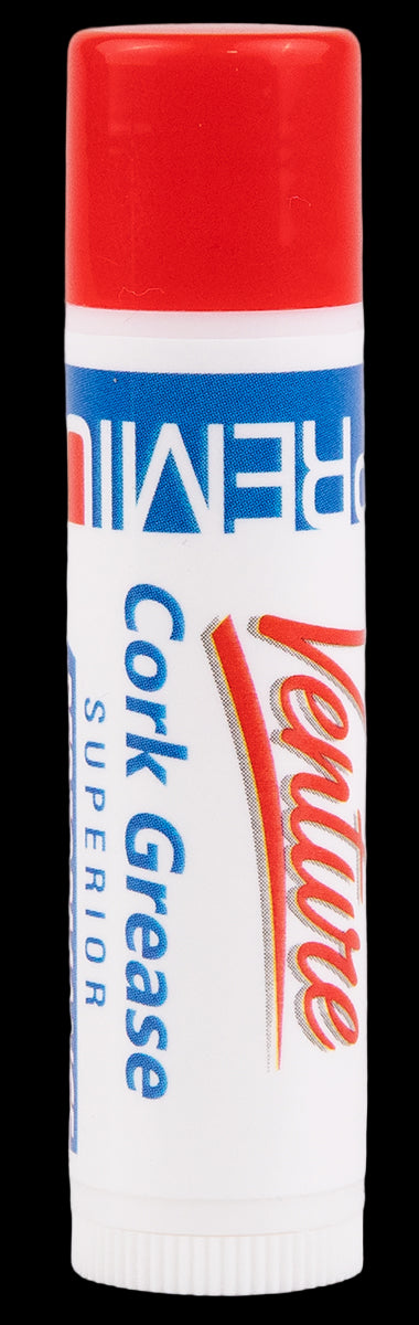 The image shows a tube of Hellwig Cork Grease, a maintenance product for woodwind instruments like clarinets and saxophones. It has a red cap with white and blue labeling. Cork grease lubricates cork joints, easing assembly, preventing drying and cracking, and ensuring a proper seal for better playability and intonation. This essential product helps woodwind players keep their instruments in good condition.