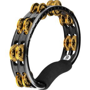 Black and gold tambourine on a white background