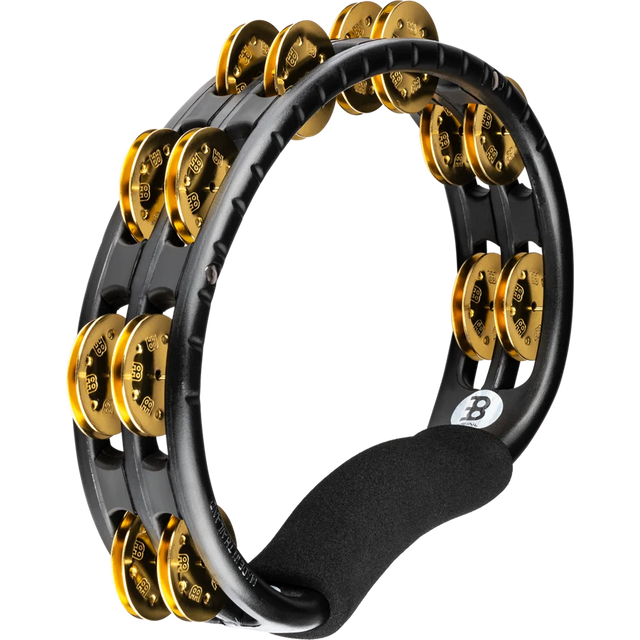 Black and gold tambourine on a white background