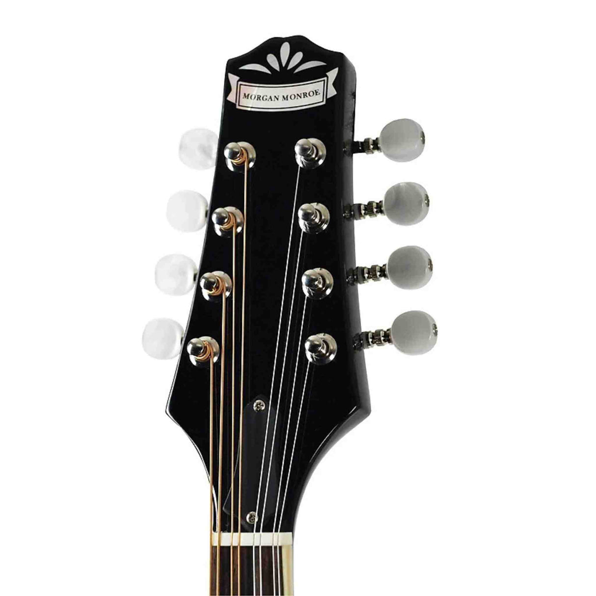 The image shows the headstock of a Morgan Monroe mandolin with 8 strings in 4 pairs and 8 tuning pegs featuring white tuning buttons. It has a black headstock with decorative inlay, the Morgan Monroe label, and a traditional angled mandolin shape. The instrument is a small, stringed lute-family instrument known for its bright, resonant sound, commonly used in folk and bluegrass music.