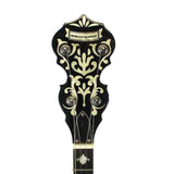 The image shows the headstock of a Morgan Monroe banjo with a glossy black finish and cream-colored scrollwork inlays. It features the "MORGAN MONROE" name at the top, four chrome tuning pegs, Victorian-style decorative flourishes, a crown pattern at the tip, and a small inlay on the neck. The headstock's wide, ornate shape reflects the traditional bluegrass and folk banjo design.