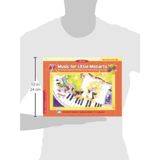 The image shows a person holding a colorful music education book titled "Music for Little Mozarts: Music Recital Book 1" by Alfred. The cover features cartoon children and musical characters around a piano keyboard, with bright orange and yellow tones. This beginner piano method book for young learners measures about 10 inches tall and includes simple pieces, basic theory, and engaging illustrations designed to make learning fun.