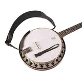 The image shows a complete banjo, a string instrument linked to American folk and bluegrass music. It features a circular body with a white drumhead, a long neck with frets and tuning pegs, multiple strings, tension hooks around the rim, a tailpiece, and a carrying strap. The banjo’s strings are plucked while its drum-like membrane produces a bright, percussive tone.