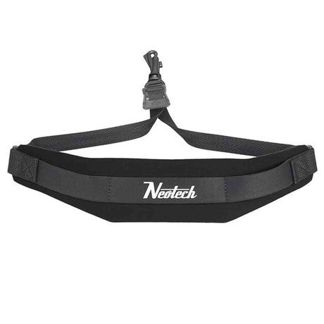 The image shows a Neotech saxophone neck strap designed to support the instrument’s weight comfortably. It features black padded neoprene, the Neotech logo in white, an adjustable strap with a quick-release or swivel hook, and an ergonomic curved shape for even weight distribution, helping players maintain good posture and reduce neck fatigue during extended use.