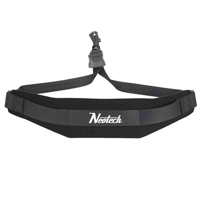 The image shows a Neotech saxophone neck strap designed to support the instrument’s weight comfortably. It features black padded neoprene, the Neotech logo in white, an adjustable strap with a quick-release or swivel hook, and an ergonomic curved shape for even weight distribution, helping players maintain good posture and reduce neck fatigue during extended use.