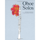 Book cover of 'Oboe Solos' with an oboe illustration and red flowers on a light blue background.