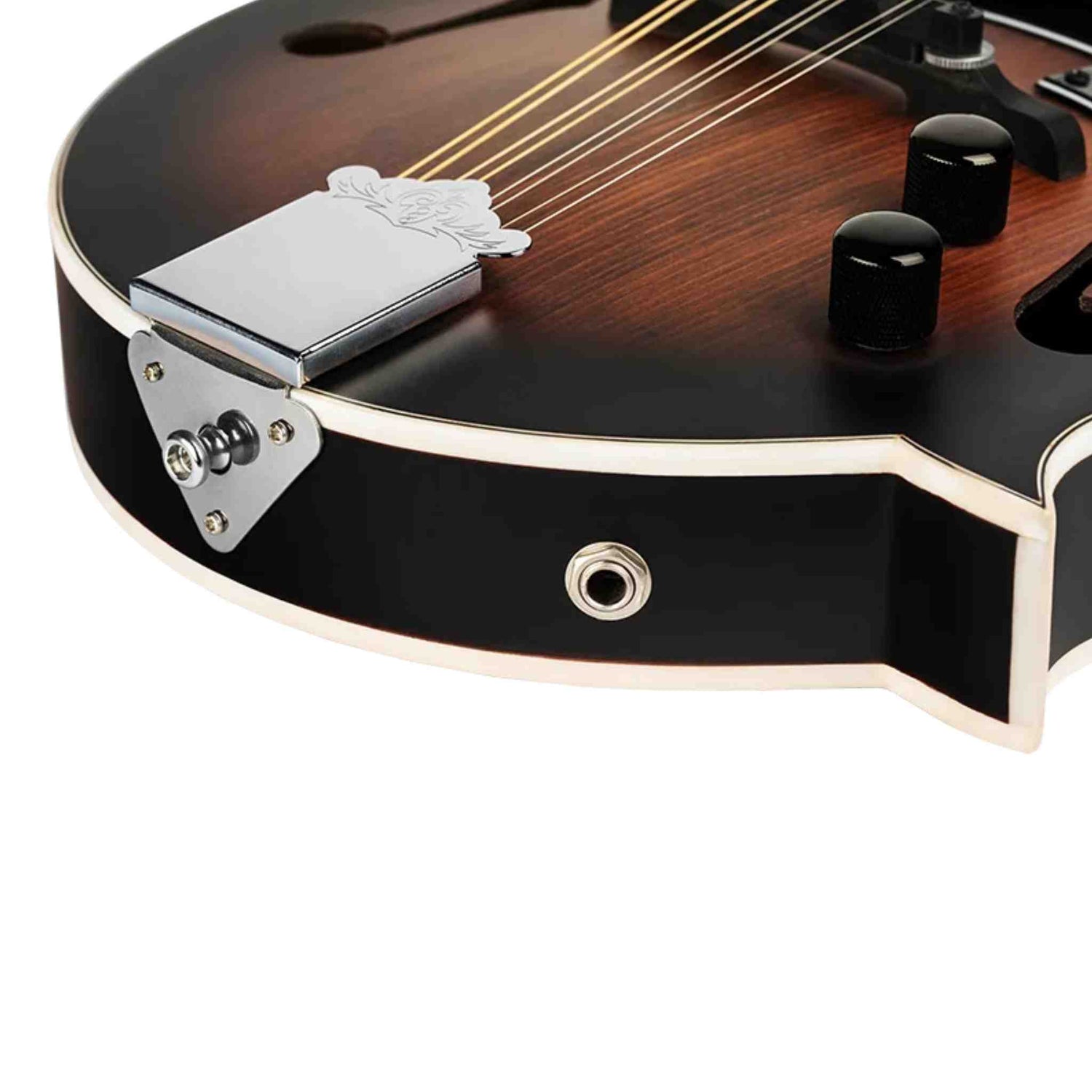 The image shows a close-up of an electric mandolin with a semi-hollow sunburst body, cream binding, and F-holes. It features multiple metal strings, a chrome magnetic pickup near the bridge, black control knobs, and chrome hardware. An output jack is visible for amplification. This high-quality instrument blends traditional acoustic design with modern electric features, suitable for both acoustic and amplified play.