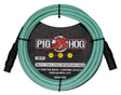 The image shows a 10-foot Pig Hog professional microphone cable from the HEX series, featuring seafoam green/turquoise shielding and black male and female XLR connectors. It displays the Pig Hog red pig logo and is marketed as "built for the road" with a lifetime guarantee. This standard XLR cable connects microphones to audio equipment and is easily identifiable by its distinctive color.