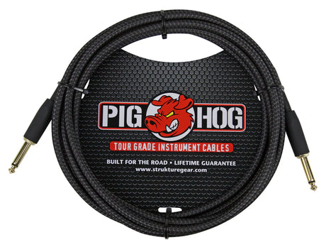 The image shows a Pig Hog tour grade instrument cable with 1/4" mono jack plugs on both ends, featuring a black braided outer jacket for durability. It displays the red pig mascot logo, "Built for the road" and "Lifetime guarantee" claims, and the website struktuegear.com on the packaging. This professional-quality cable is designed for electric guitars and basses, ensuring reliable signal transmission during live performances.