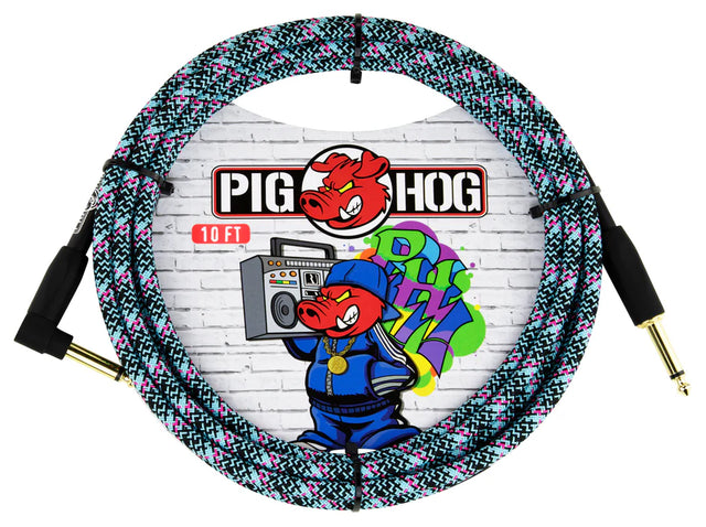 The image shows a Pig Hog instrument cable with a colorful woven fabric sleeve in black, white, pink, and teal. It has gold-plated 1/4" connectors on both ends and a 10 FT length marking on the packaging. The Pig Hog logo features their cartoon pig mascot. This durable, tangle-resistant cable is popular with musicians for connecting electric instruments to amps and pedals, noted for its street art-inspired design.