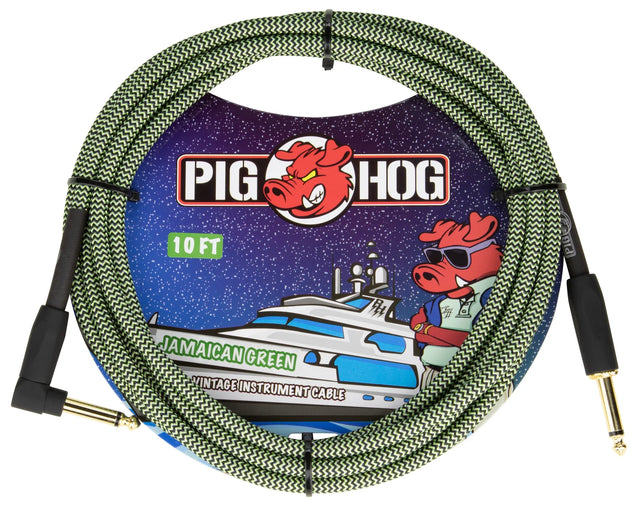 The image shows a Pig Hog 10-foot "Jamaican Green" vintage instrument cable with a green and black braided zigzag exterior and gold-plated 1/4" connectors—one straight and one right-angle. The packaging features the Pig Hog red pig mascot wearing sunglasses and a yacht illustration. This durable cable is designed for reliable signal transmission between guitars or instruments and amps or pedals.
