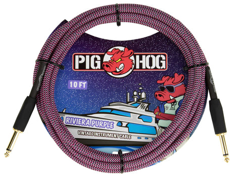 The image shows a Pig Hog "Riviera Purple" 10-foot instrument cable. It features a purple and black braided jacket, gold-plated 1/4" connectors, and Pig Hog’s red pig mascot logo. The vintage-style packaging has a nautical theme with a yacht and the pig wearing sunglasses. Known for durability and professional quality, this cable is designed for electric guitars, basses, and other instruments.