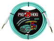 The image shows a 10-foot Pig Hog vintage instrument cable in seafoam green with gold-plated 1/4" connectors. It features Pig Hog’s distinctive packaging, including their red pig logo and a retro-style vintage car with surfboards, giving it a surf/vintage look. This guitar/instrument cable connects electric guitars, basses, or other instruments to amplifiers, combining functionality with a stylish, nostalgic design.