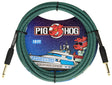 The image shows a Pig Hog "Tahitian Blue" vintage 10-foot instrument cable with a turquoise and black woven chevron pattern. It has gold-plated 1/4" connectors with black strain reliefs. The packaging features Pig Hog’s red pig mascot and nautical artwork, including a yacht and a pig wearing sunglasses. Designed for guitars, basses, and keyboards, it combines durability with a stylish, maritime-inspired look.