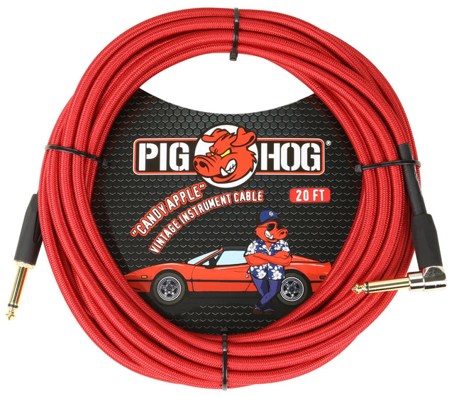 The image shows a Pig Hog "Candy Apple" vintage-style 20-foot instrument cable with a red woven exterior and gold-plated connectors—one straight and one right-angle 1/4" plug. The cable is coiled with black ties, and the packaging features Pig Hog’s pig mascot in vintage attire beside a classic red sports car. This high-quality cable is ideal for guitars, basses, and keyboards, carrying audio signals to amps or pedals.