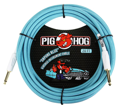 The image shows a Pig Hog "Daphne Blue" 20-foot vintage-style instrument cable with a light blue braided exterior, gold-plated 1/4" plugs, and the red pig mascot logo. It features black packaging decorated with a vintage car and pig graphic. Designed for electric guitars and other instruments, this durable, professional-grade cable combines reliable performance with distinctive, colorful styling.