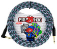 The image shows a Pig Hog 20-foot guitar cable with a woven fabric jacket in black, white, teal, and pink/purple, featuring a textile-like pattern instead of plain rubber. It has gold-plated 1/4" connectors, one straight and one right-angle, for instrument connections. The durable, flexible design combines unique aesthetics with protection, typical of Pig Hog's high-quality cables.
