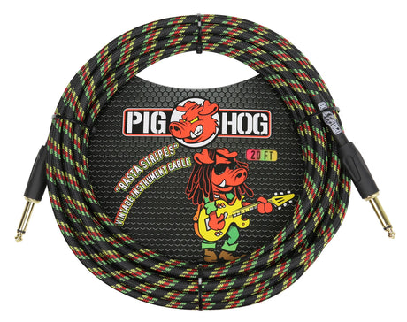 The image shows a Pig Hog 20-foot "Rasta Stripes" instrument cable with a woven fabric jacket in black, green, yellow, and red. It is coiled, featuring 1/4-inch mono jacks—one straight and one right-angle. The packaging displays the Pig Hog logo with a pig mascot playing guitar. This vintage-style cable is designed for connecting guitars, basses, and instruments to amps or audio gear.