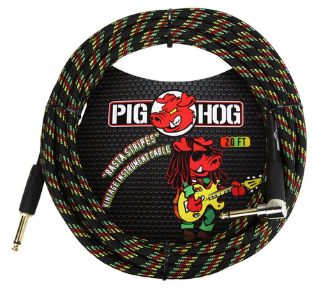 The image shows a Pig Hog "Rasta Stripes" vintage instrument cable, 20 feet long, with a woven exterior in red, yellow, green, and black. It has 1/4" plugs—one straight and one right-angle—suitable for guitars and other instruments. The packaging features the Pig Hog logo with a red pig mascot playing guitar. The colorful braided design adds durability and prevents tangling.