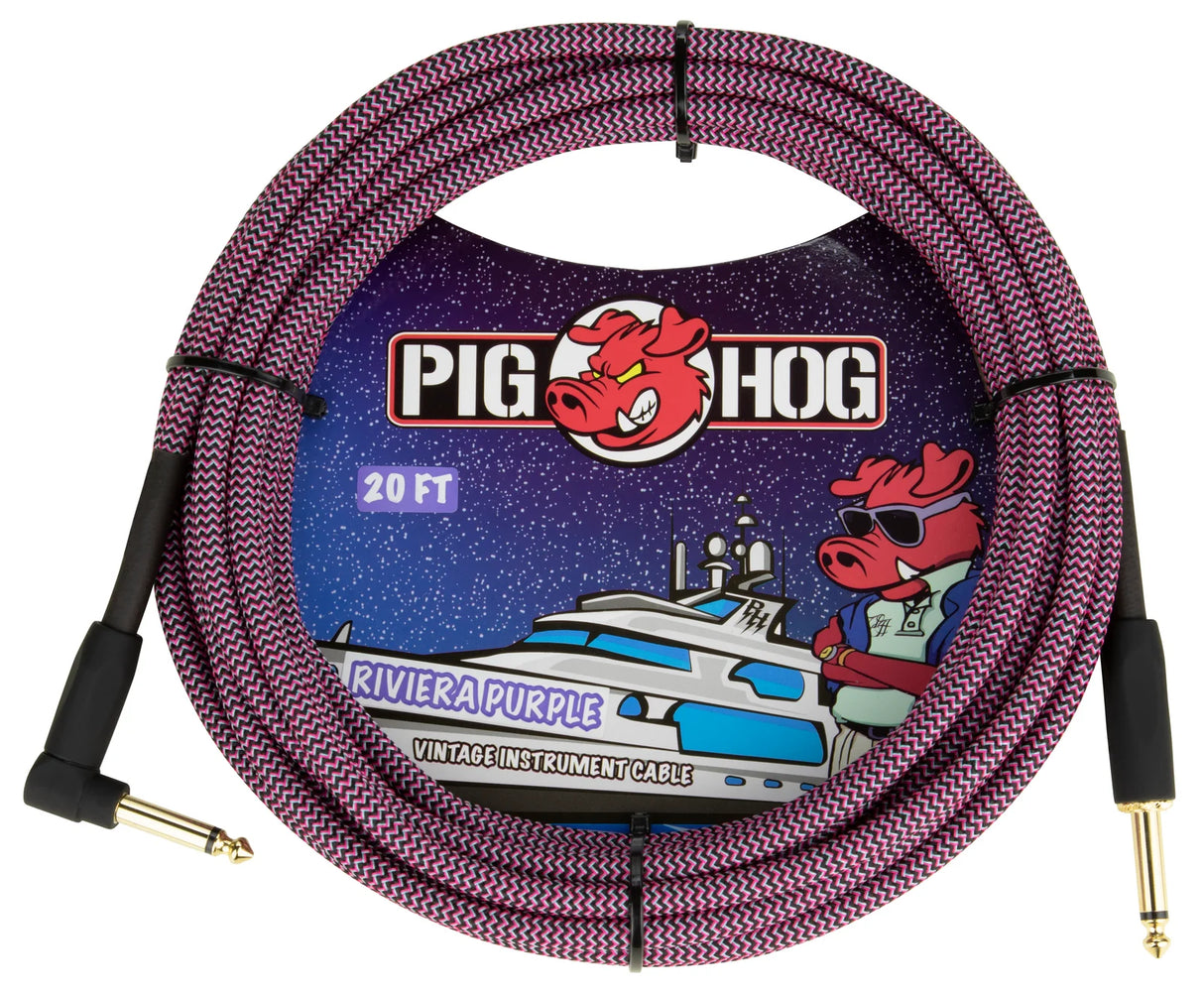 The image shows a Pig Hog "Riviera Purple" 20-foot vintage instrument cable with a purple and black braided jacket featuring a zigzag pattern. It has gold-plated 1/4" TS connectors on both ends and is coiled with cable ties. The packaging includes colorful yacht-themed artwork. This durable cable connects guitars, basses, or other instruments to amplifiers or pedals.