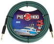The image shows a Pig Hog "Tahitian Blue" 20-foot vintage-style instrument cable with a woven green/teal zigzag fabric jacket, gold-plated 1/4" connectors, and Pig Hog branding featuring their pig mascot. Nautical-themed artwork includes a yacht and the pig wearing sunglasses. Designed for guitars, basses, and amps, it combines reliable performance with a distinctive, eye-catching look.