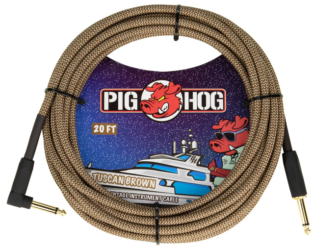 The image shows a 20-foot Pig Hog "Tuscan Brown" vintage-style instrument cable with a brown braided exterior and gold-plated 1/4" TS connectors—one straight and one right-angle. It features the Pig Hog logo with a cartoon pig mascot. The packaging has a nautical theme with the pig wearing sunglasses. This durable, vintage-look cable is used to connect guitars and other instruments to amps and pedals.