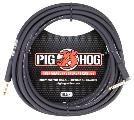 The image shows a Pig Hog Tour Grade instrument cable with a black 18.5-foot cable and black connectors—one straight and one right-angle 1/4" plug. It features the red pig logo, "Built for the Road," and "Lifetime Guarantee" markings. The cable is displayed on hexagonal mesh packaging, designed for electric guitarists, bassists, and musicians needing durable, professional-grade audio connections.