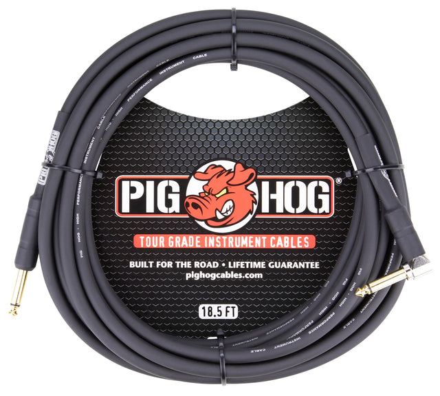The image shows a Pig Hog Tour Grade instrument cable with a black 18.5-foot cable and black connectors—one straight and one right-angle 1/4" plug. It features the red pig logo, "Built for the Road," and "Lifetime Guarantee" markings. The cable is displayed on hexagonal mesh packaging, designed for electric guitarists, bassists, and musicians needing durable, professional-grade audio connections.