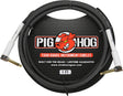 The image shows a black coiled Pig Hog instrument cable with red pig branding and silver 1/4" plugs on both ends. Designed as a touring-grade professional audio cable, it features a lifetime guarantee. The spiral design helps prevent tangling, making it ideal for electric guitars, basses, keyboards, and other electronic instruments connecting to amps or audio equipment.