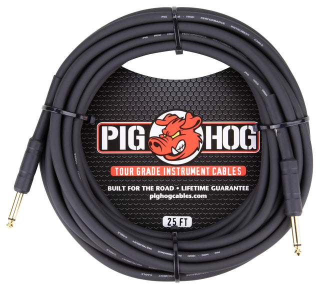 The image shows a coiled 25-foot Pig Hog tour-grade instrument cable with black sheathing and gold-plated 1/4" connectors. It features a black hexagonal mesh label with the Pig Hog logo and red pig mascot, stating "Tour Grade Instrument Cable," "Built for the Road," and a "Lifetime Guarantee." The packaging includes the website "pighogcables.com." This high-quality cable is designed for professional use with guitars, basses, and other electronic instruments.