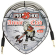 The image shows a Pig Hog "Armor Clad" 20-foot instrument cable with a durable braided outer covering. It features a shield-shaped logo with an armored pig mascot holding a guitar, representing the Pig Hog brand. The cable has gold-tipped 1/4" TS connectors, suitable for guitars and instruments, designed for reliable, durable connections in live or studio settings.