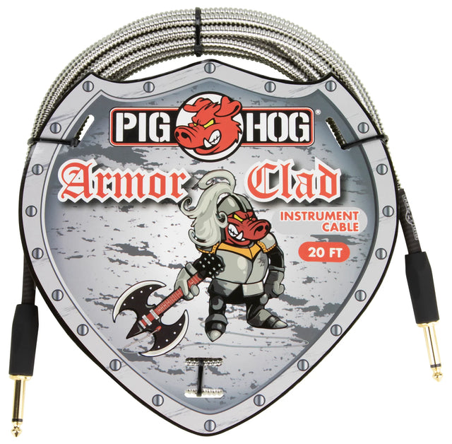 The image shows a Pig Hog "Armor Clad" 20-foot instrument cable with a durable braided outer covering. It features a shield-shaped logo with an armored pig mascot holding a guitar, representing the Pig Hog brand. The cable has gold-tipped 1/4" TS connectors, suitable for guitars and instruments, designed for reliable, durable connections in live or studio settings.
