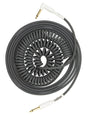 The image shows a coiled instrument cable with gold-plated 1/4" TS connectors and white housings. Its dark gray/black spiral design stretches and retracts, preventing tangles and allowing freedom of movement. Popular among guitarists and bassists, it connects electric instruments to amps or pedals, offering a classic vintage look favored in rock and blues.